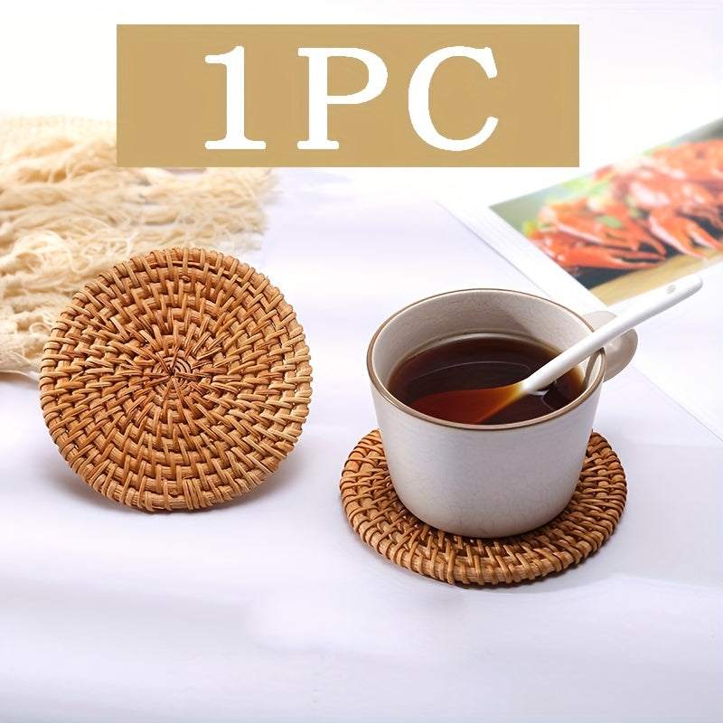 Handmade rattan coaster with ceramic cup of tea on white surface, heat resistant non-slip drink mat