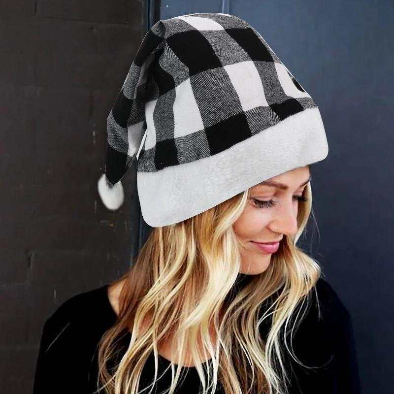 Woman wearing black and white plaid party Christmas hat with white trim and pompom