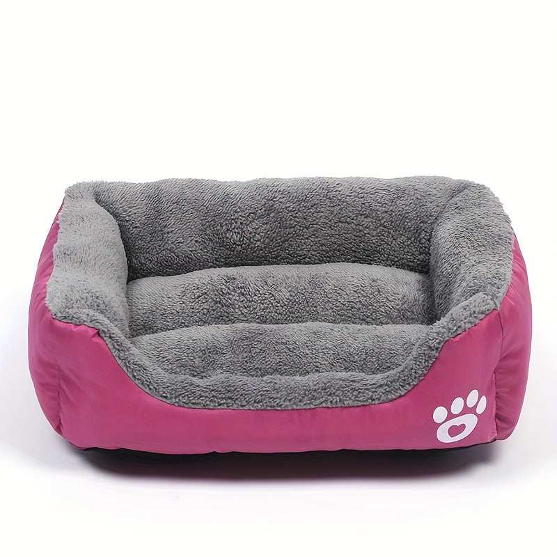 Large washable dog bed with plush gray interior and pink exterior featuring paw print design