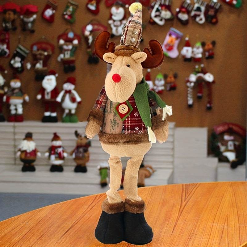 Festive fabric reindeer Christmas decoration doll standing on wooden table with holiday decor background