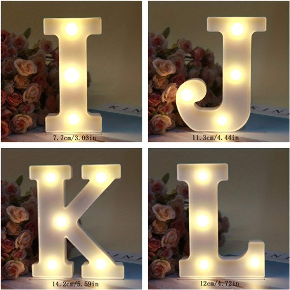 Alphabet letter LED lights illuminating warm white battery-powered tabletop decor for parties and home decoration