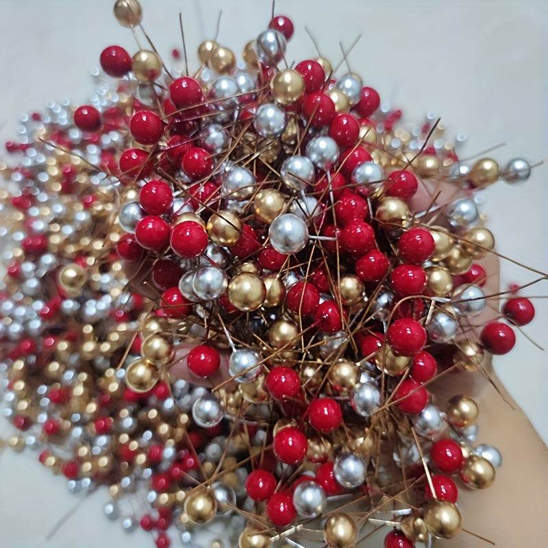 Close-up of vibrant mixed color artificial red berries in red, gold, and silver for holiday decor and DIY wreaths