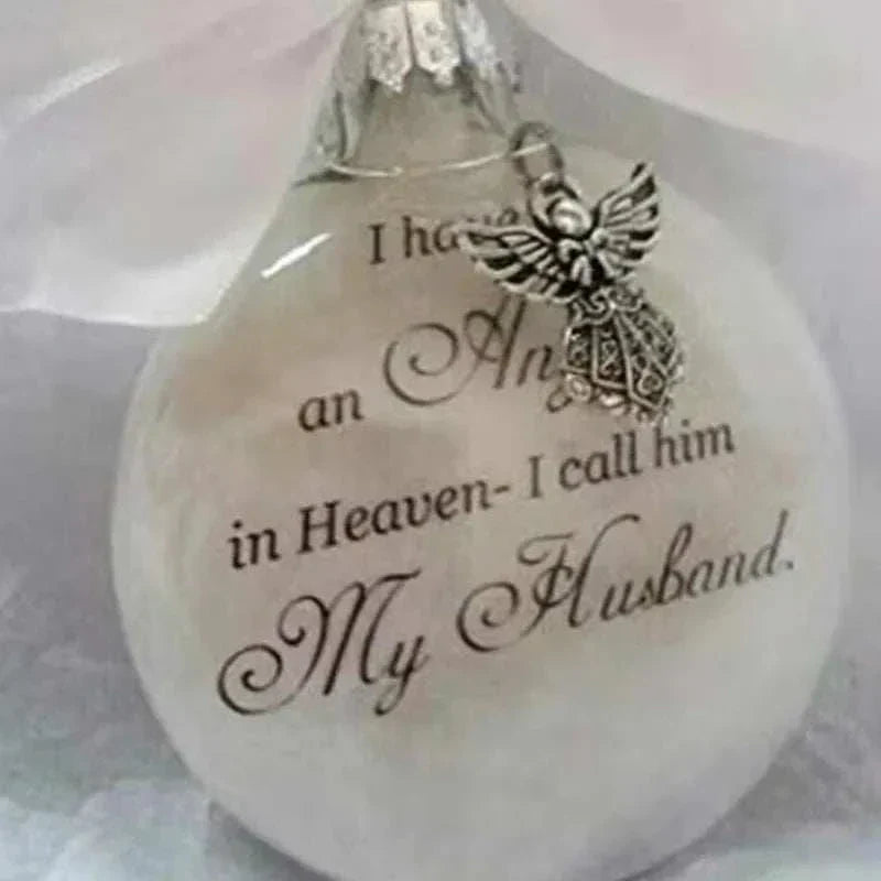 Christmas Memory Ball ornament with angel charm and memorial inscription for husband, white plastic decorative bauble