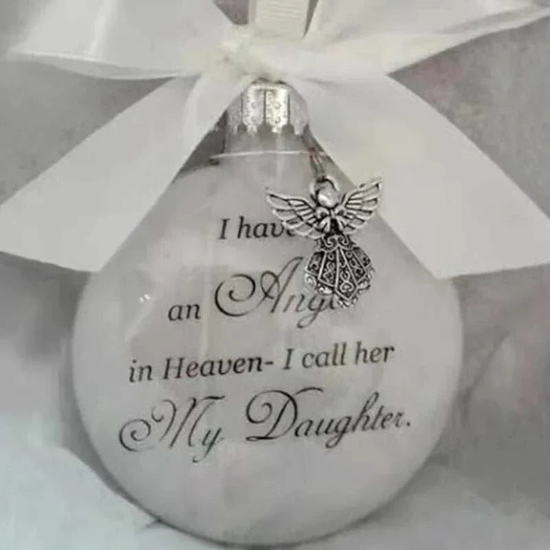 white Christmas Memory Ball ornament with angel charm and "My Daughter" commemorative text