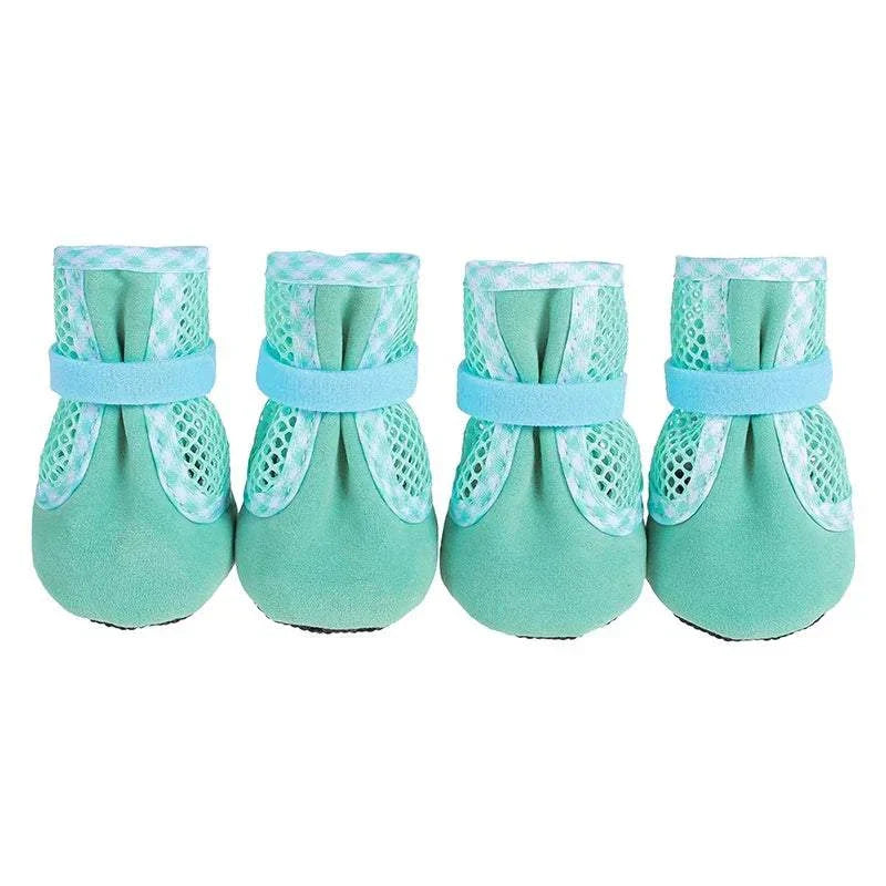 Set of four wear resistant dog cat boots with adjustable drawstring and non-slip soles in light blue and mesh fabric
