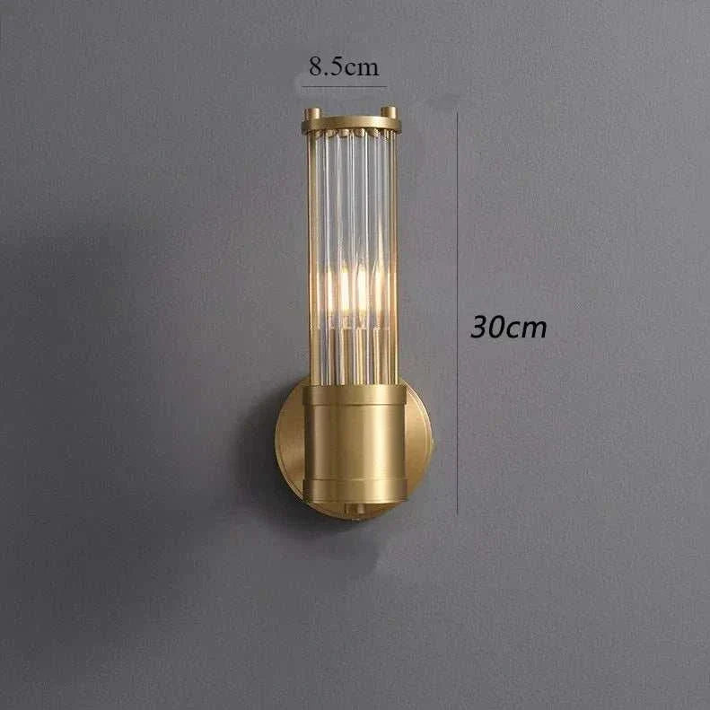 Luxury gold wall lamp with clear glass shade, modern style wall-mounted LED light for living room or bedroom decoration
