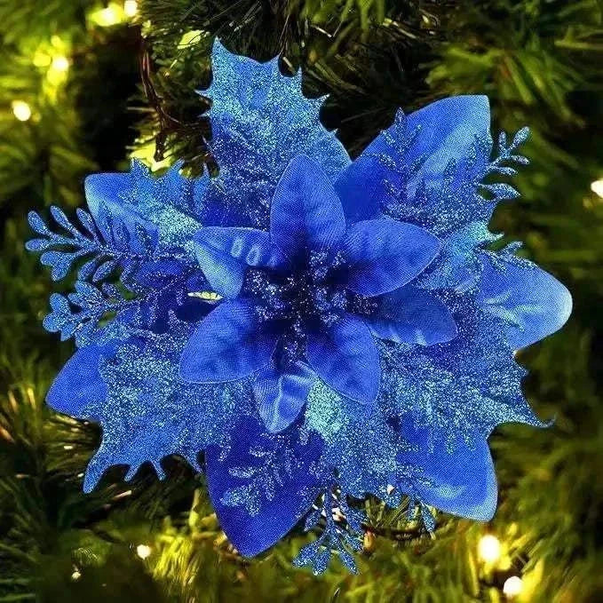 Blue glitter artificial Christmas flower decoration on tree branch