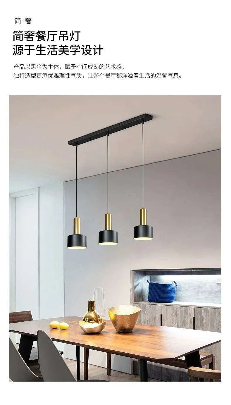 Nordic Simple Three-Chandelier Lamp hanging over modern dining table with minimalist decor