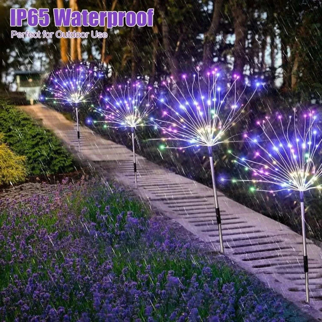 Solar firework string lights in garden pathway, waterproof outdoor decorative lighting with colorful glowing bulbs