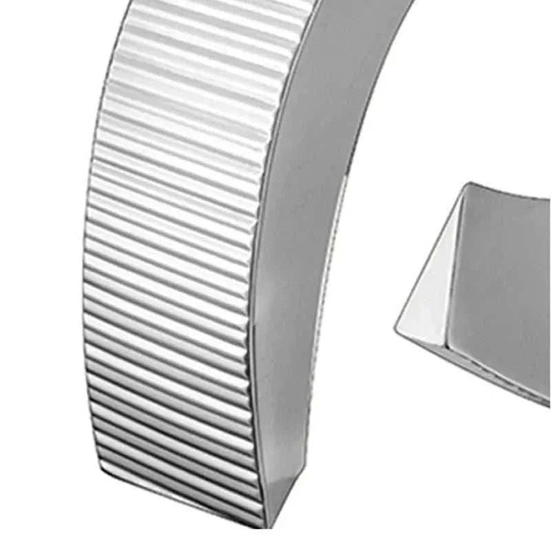 Modern stainless steel minimalist vase with ribbed texture for living room or office decor