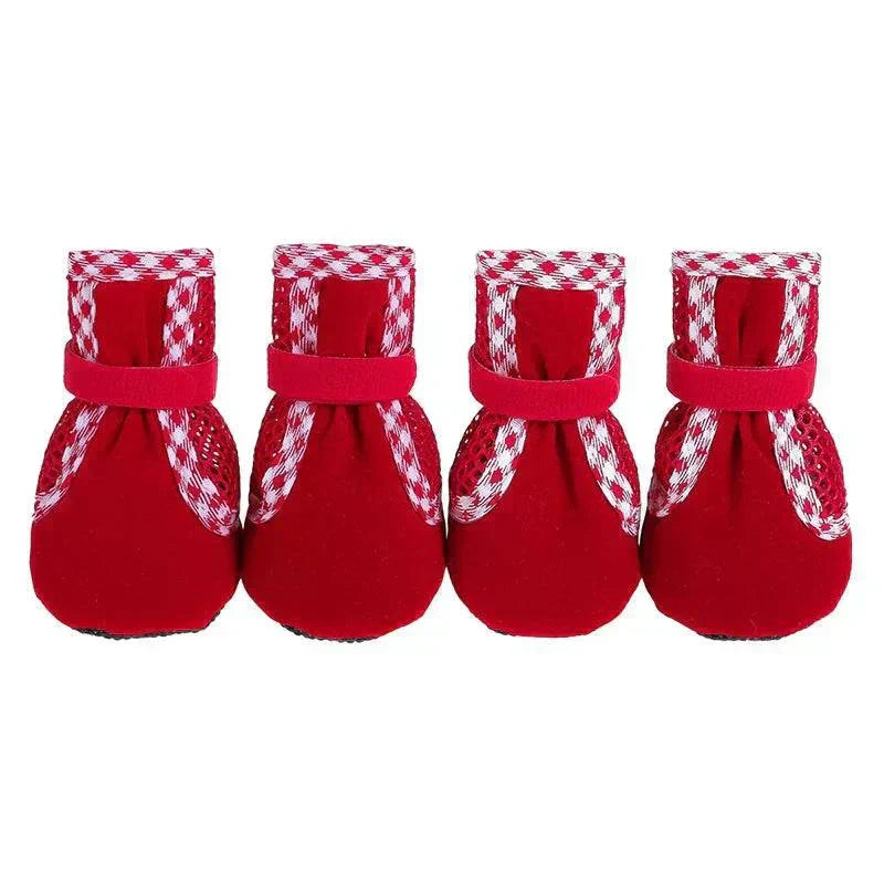 Set of four red wear resistant dog cat boots with adjustable drawstring and anti-slip sole for outdoor use