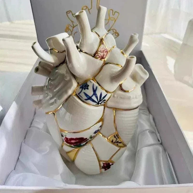 Ceramics vase with a unique anatomical heart design and painted porcelain details for minimalist home decor