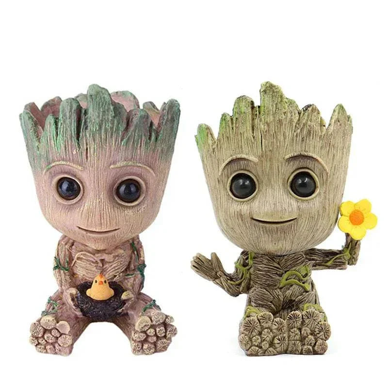 Set of two modern vases for flowers shaped like Groot anime figurines, plastic garden planters and home office decoration accessories.