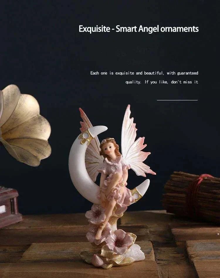 Nordic Beautiful Healing Girl Fairy Resin Ornament sitting on a crescent moon with delicate wings and floral base home décor sculpture