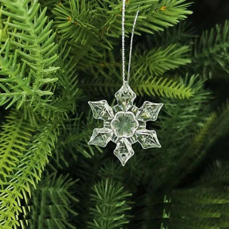 Crystal snowflake Christmas tree pendant ornament hanging on green pine branch for holiday decoration
