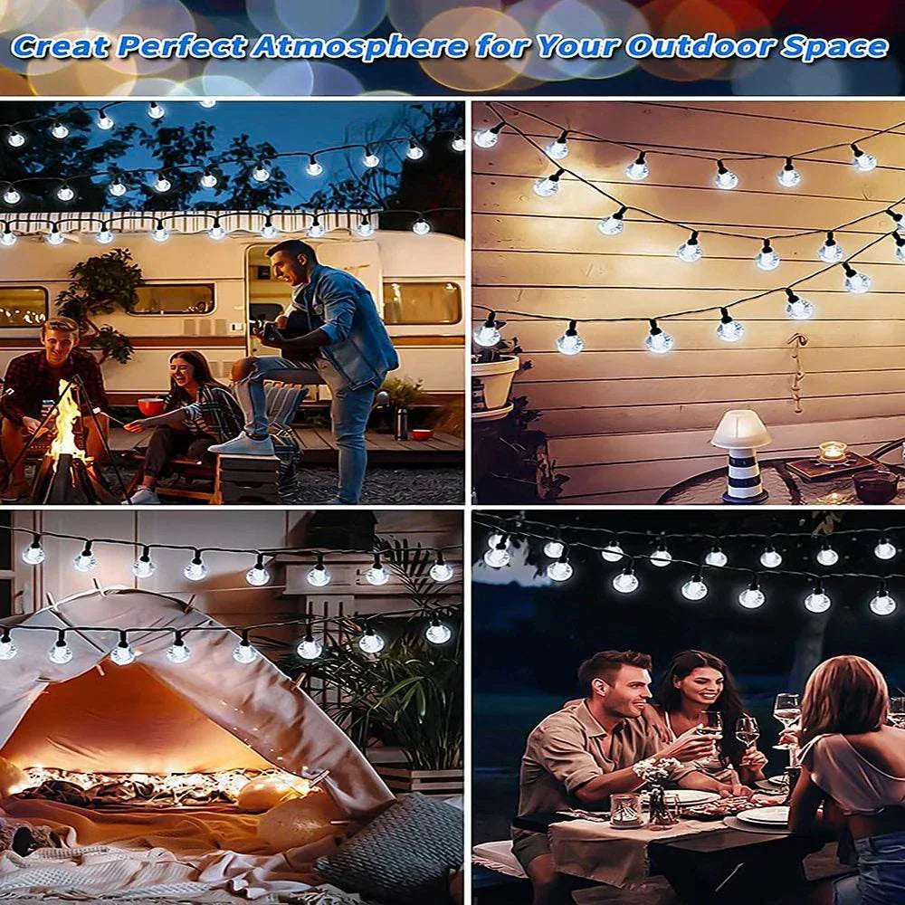 Solar Bubble Ball String Lights hanging outdoor with warm white LED lights creating cozy atmosphere for garden patio holiday party decoration