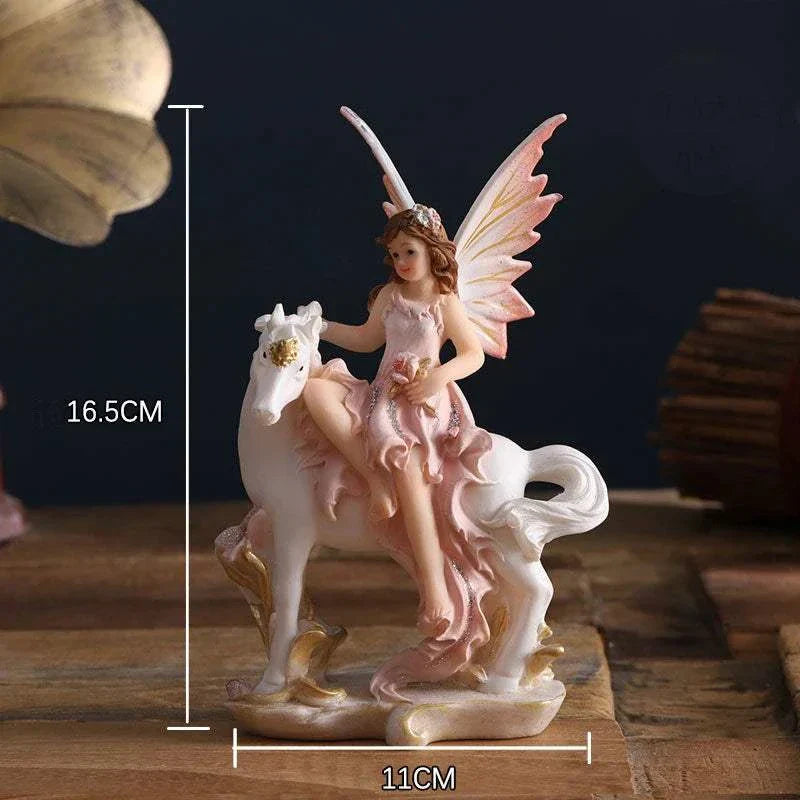 Nordic Beautiful Healing Girl Fairy Resin Ornament sitting on white unicorn figurine for home decor