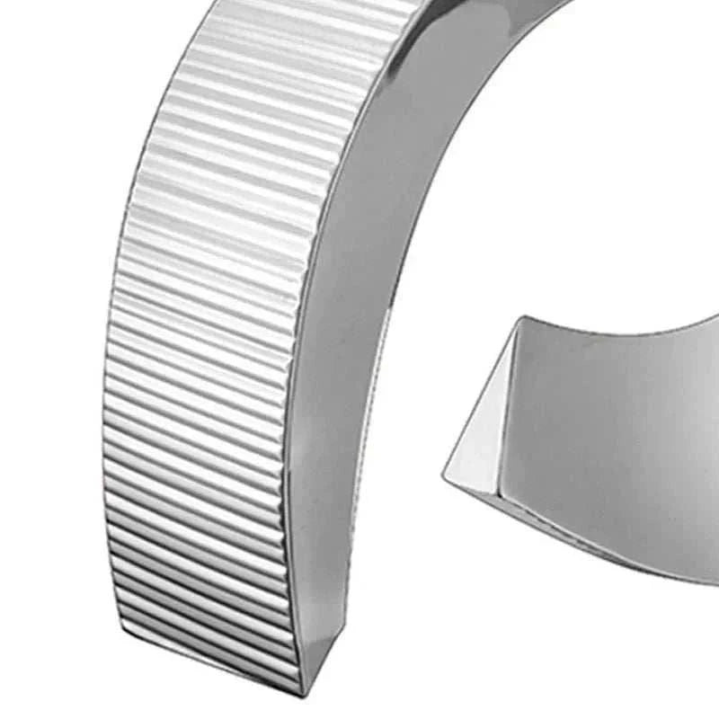 Modern stainless steel minimalistic metal vase with ribbed texture for table decoration