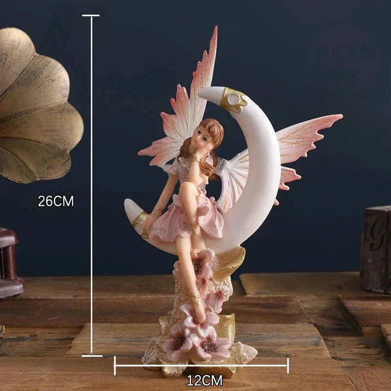 Nordic Beautiful Healing Girl Fairy Resin Ornament figurine with pink wings sitting on crescent moon sculpture for home decor