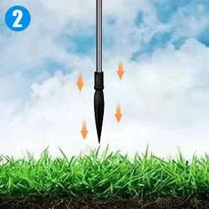 Solar Firework String Lights stainless steel stake installation in grass for outdoor use