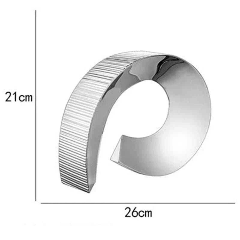Modern stainless steel decorative vase with curved minimalist design, 21cm tall and 26cm wide, perfect for office or living room decor