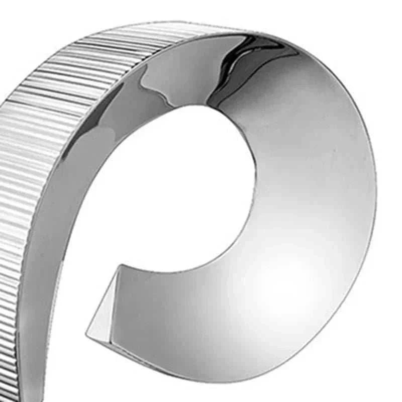 Sleek modern stainless steel vase with elegant curved design for home or office decor