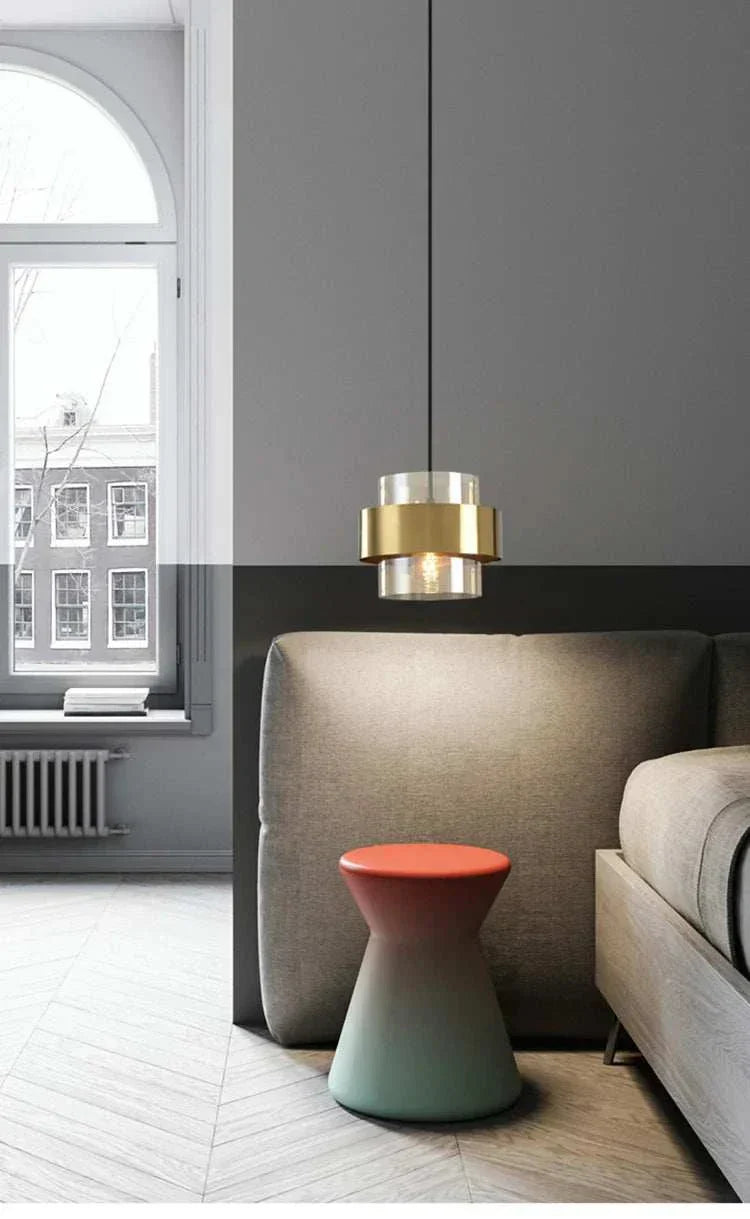 Modern post-modern bedroom art decor pendant LED lamp with gold and glass design hanging in stylish room
