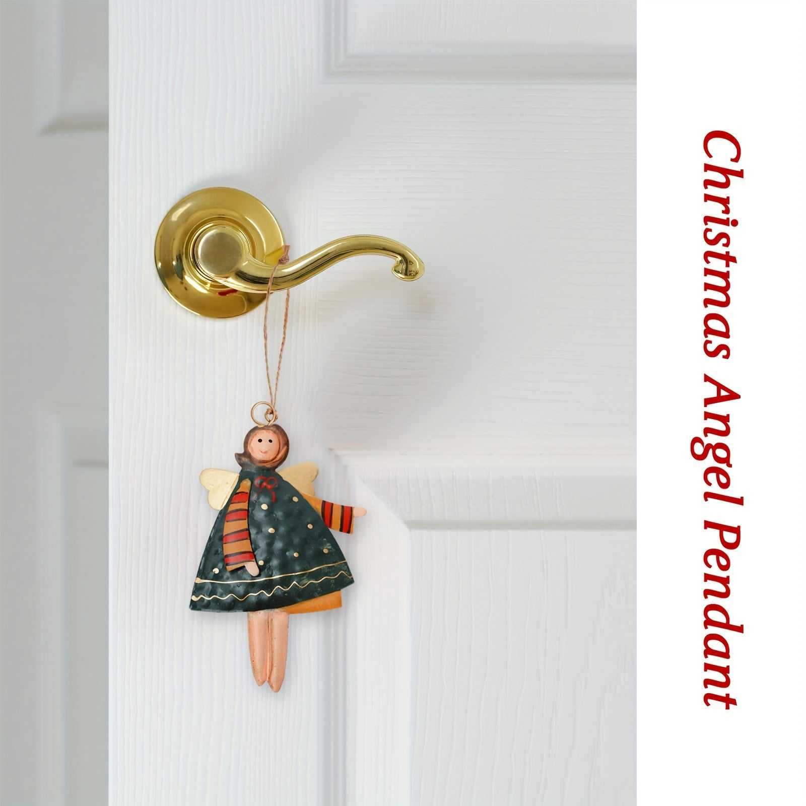 Painted metal angel ornament hanging on a golden door handle Christmas decoration
