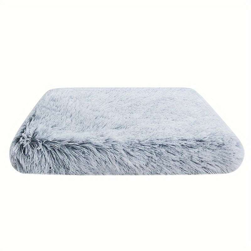 Soft plush rectangular dog bed in grey with non-slip bottom for dogs and cats